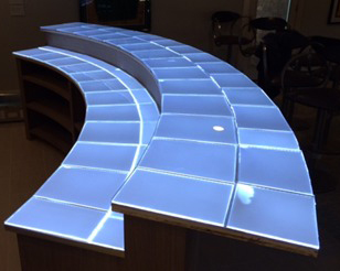 SLABlite panels to light onyx countertop